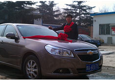 超前涂料獎勵員工轎車，真石漆生產(chǎn)廠家！